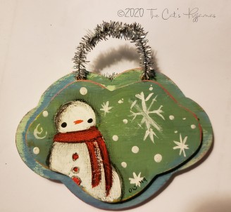 Snowman on green ornament